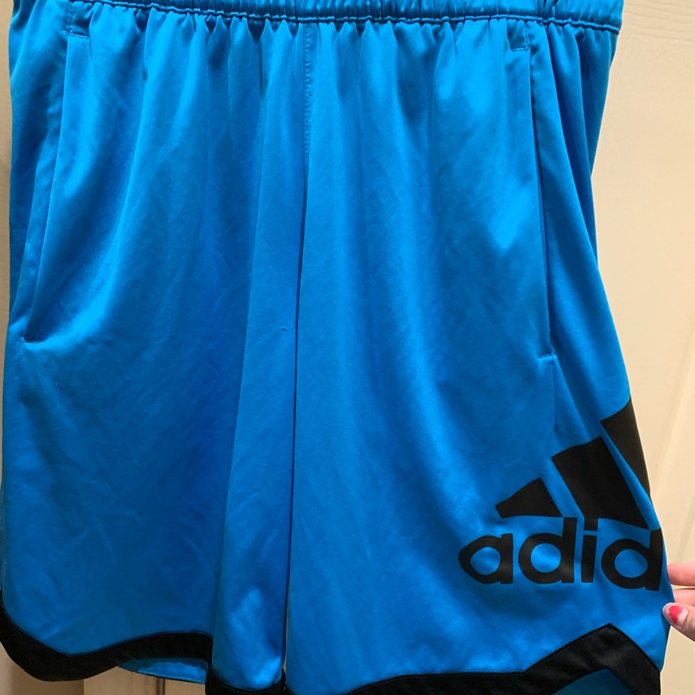 Light blue Shorts with pockets, Adidas small. Like new. Cross site listed. Sold
